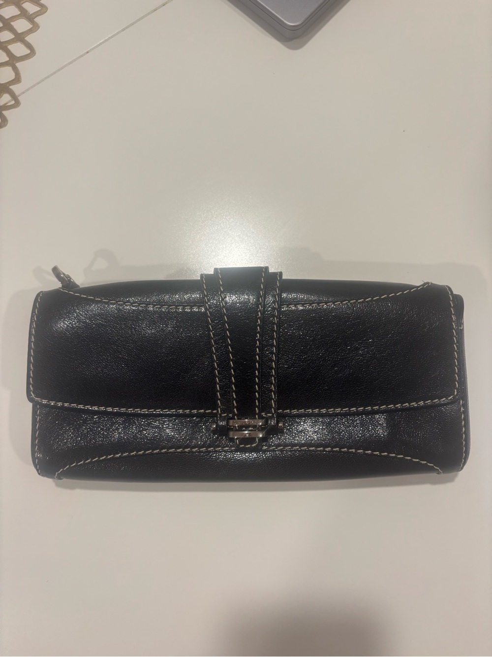 Originally a Celine Purse into a clutch bag.